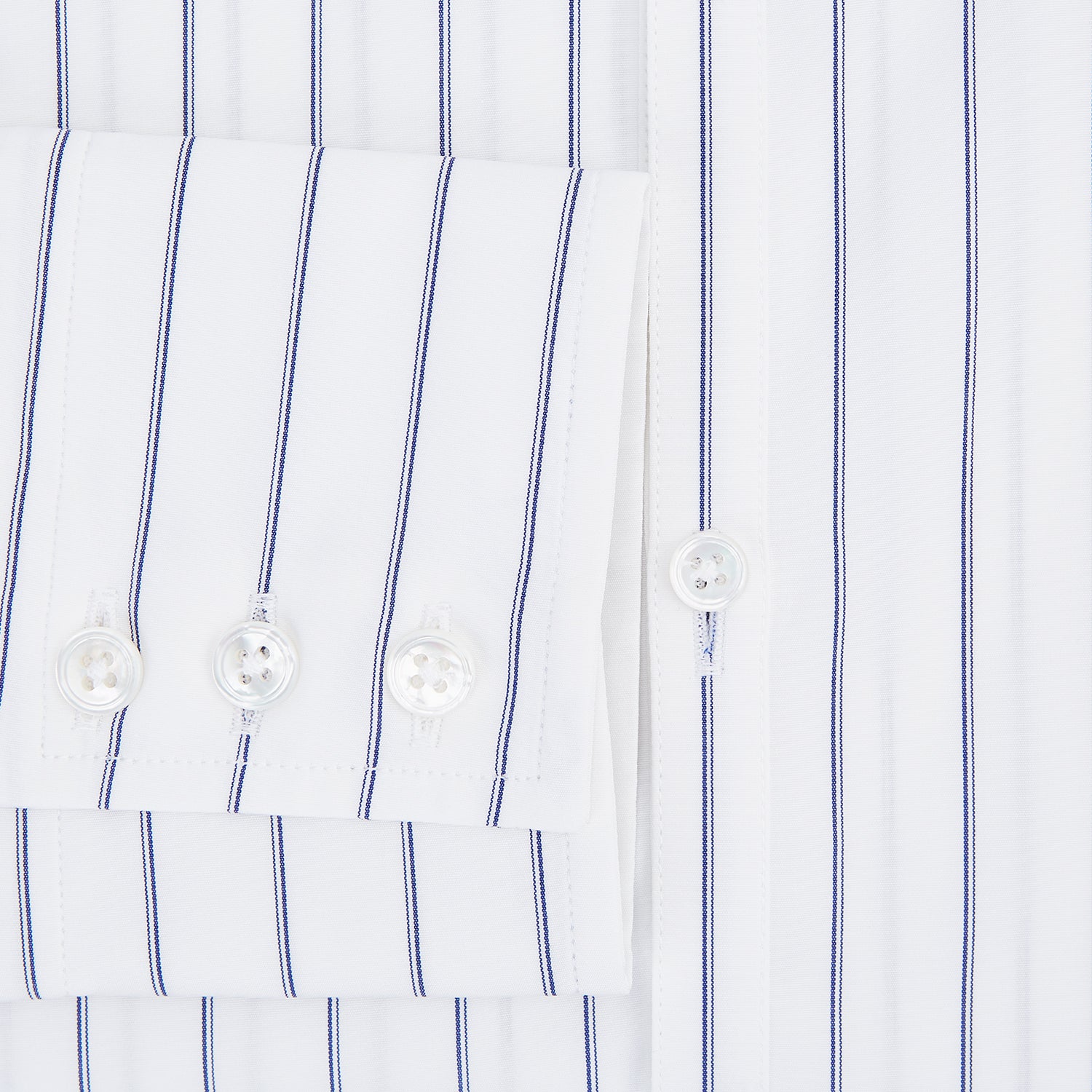 View 4 of product The Dark Navy Double-Pinstripe Westminster Shirt by Turnbull & Asser, featuring a Turnbull collar and cuffed sleeves, is displayed laid flat on a plain white background, highlighting its British craftsmanship.