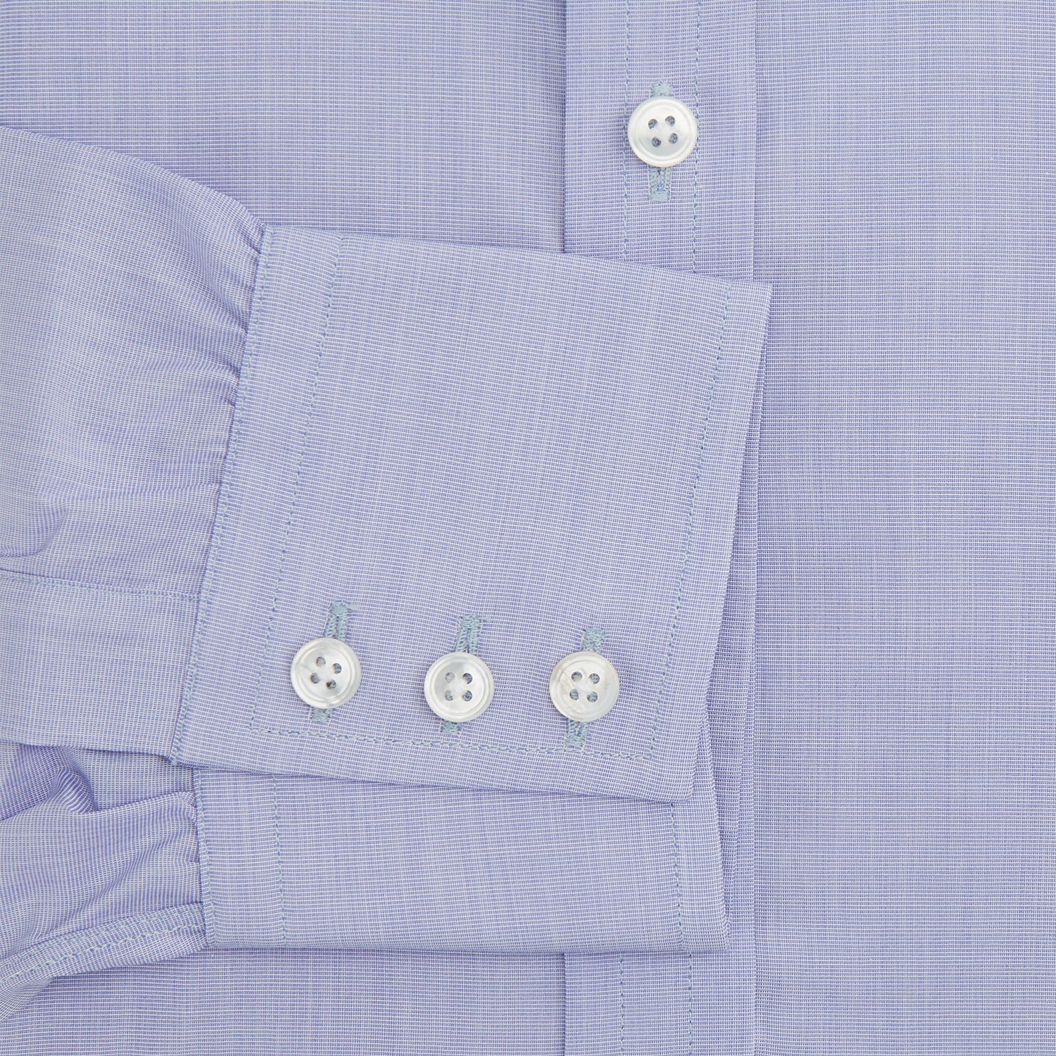 View 4 of product The Turnbull & Asser Blue End-on-End Cotton Shirt features a T&A collar and 3-button cuffs, perfect for pairing with a navy suit or smart ensemble, and is displayed flat against a white background.