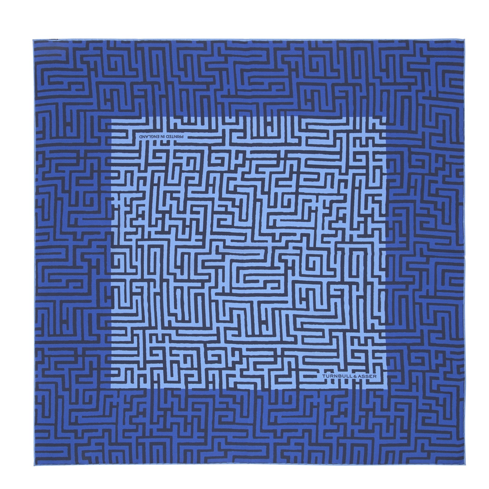 View 2 of product The Blue Maze Silk Pocket Square by Turnbull & Asser features a geometric maze-inspired pattern and central logo, with a folded corner for an artful touch.