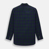 View 3 of product The Turnbull & Asser Black Watch Tartan Windsor Shirt is a long-sleeve, button-up shirt with a dark green and navy tartan pattern, white buttons, collar, and curved hem—showcasing British craftsmanship on a plain white background.