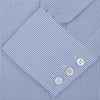 View 2 of product The Turnbull & Asser Blue Grid Check Shirt with Regent Collar and 3-Button Cuffs features white buttons and is neatly folded on a white background.