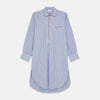 View 1 of product The Blue and Navy Halo Stripe Cotton Sussex Nightshirt by Turnbull & Asser features long sleeves, a collar, button-down front, chest pocket, curved hem, and brown piping for a classic luxury sleepwear style.