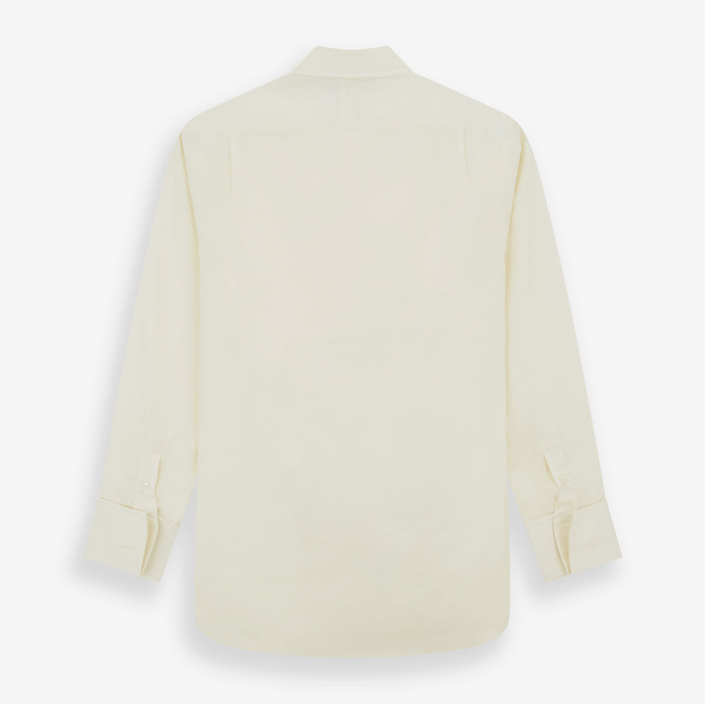 The Turnbull & Asser Tomorrow Never Dies Cream Cotton Hamburg Shirt, as seen on James Bond, features a long sleeve, button-down front, and collar. It's laid flat on a white background.
