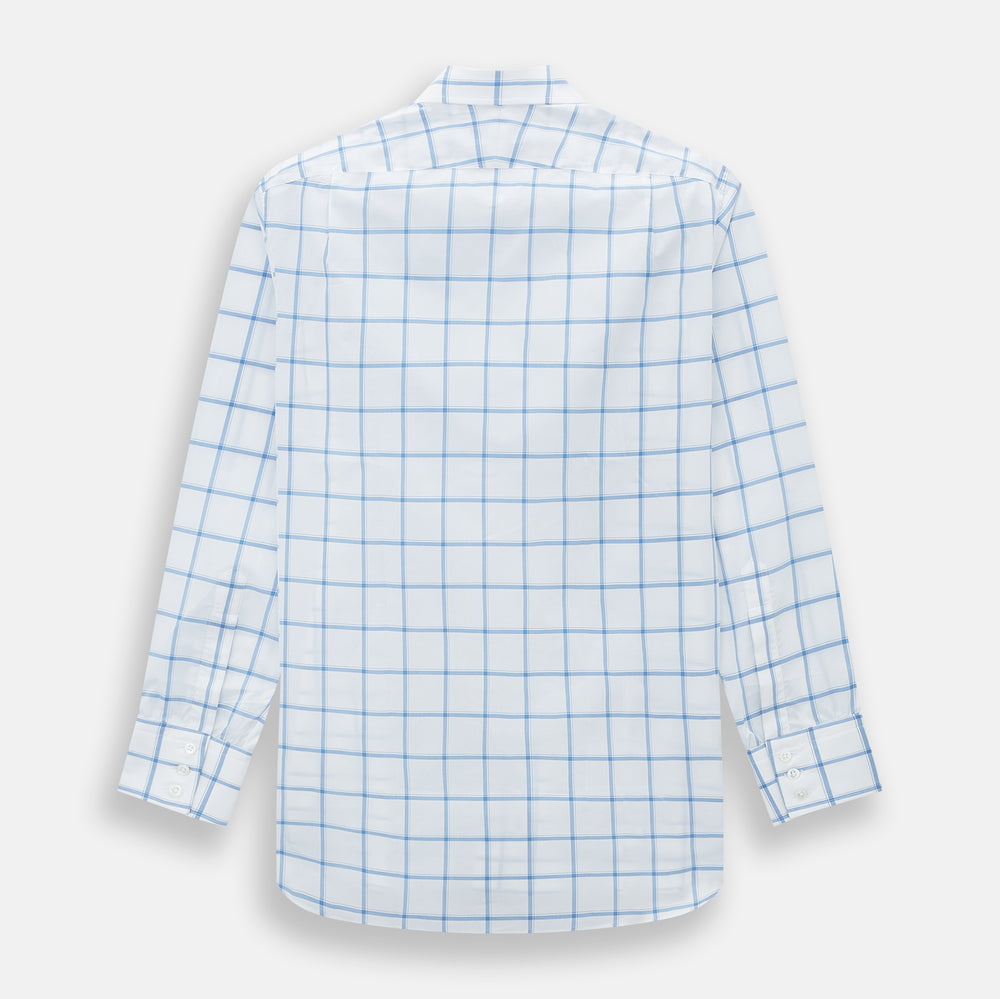 The Turnbull & Asser Colony Blue Grid Check Mayfair Shirt features long sleeves, a button-down front, Italian cotton fabric, a spread collar, and buttoned cuffs, shown against a plain white background.