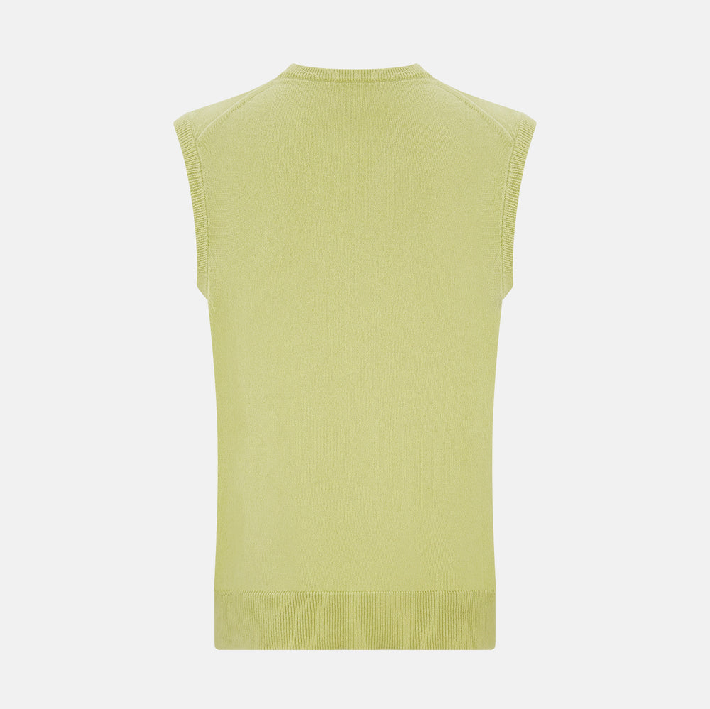 Turnbull & Asser’s Melon Green V-neck Cashmere Vest is shown on a plain white background. This sleeveless men’s jumper features ribbed neckline, armholes, and hem for subtle detail.