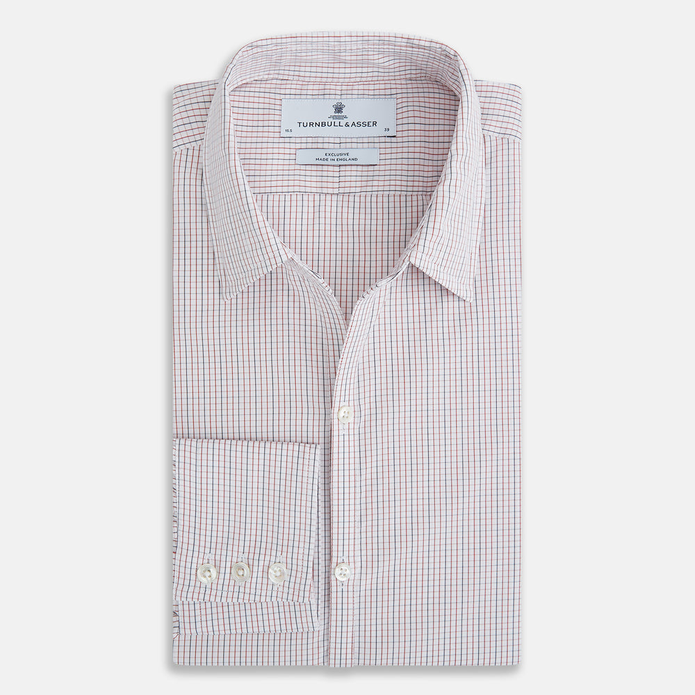 The Turnbull & Asser Red and Navy Check Windsor Shirt features a pointed collar and cuffed long sleeves, highlighting British craftsmanship. Displayed flat on a white background.