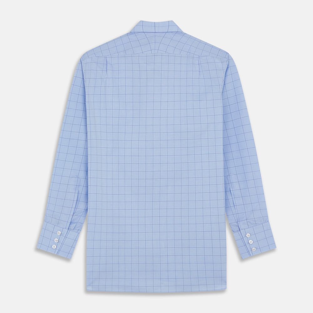 The Blue Prince of Wales Check Mayfair Shirt by Turnbull & Asser is a light blue formal long-sleeve shirt with a subtle check pattern, button-down front, and buttoned cuffs, shown laid flat on a white background.