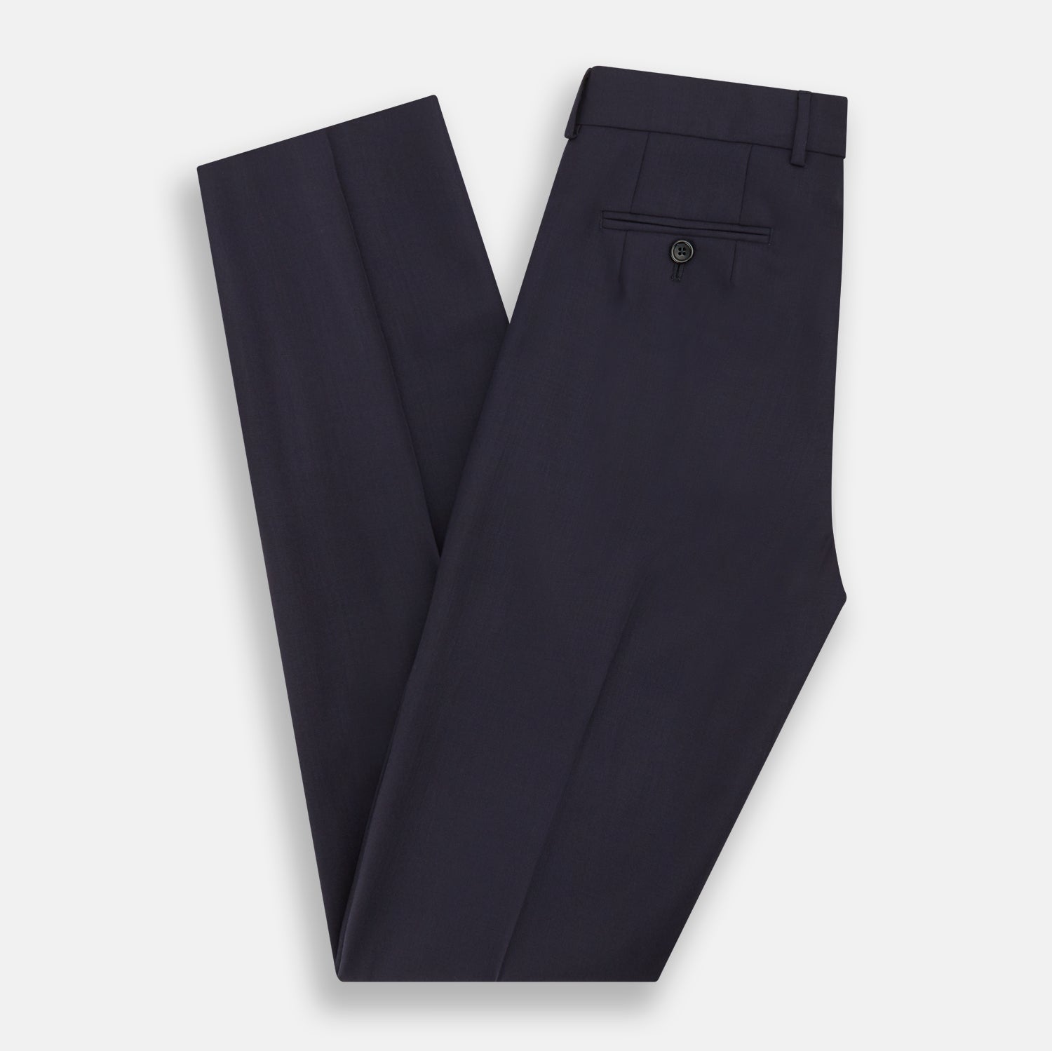 View 6 of product The Navy Rupert Trousers by Turnbull & Asser are tailored wool trousers with a button and zip closure, belt loops, and front creases, elegantly displayed against a plain white background.