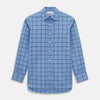 View 1 of product The Turnbull & Asser Colony Blue Grid Check Mayfair Shirt is a light blue, long-sleeve button-up with a collar and evenly spaced dark blue grid lines.
