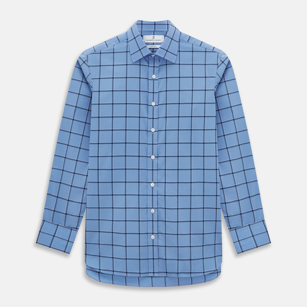 The Turnbull & Asser Colony Blue Grid Check Mayfair Shirt is a light blue, long-sleeve button-up with a collar and evenly spaced dark blue grid lines.