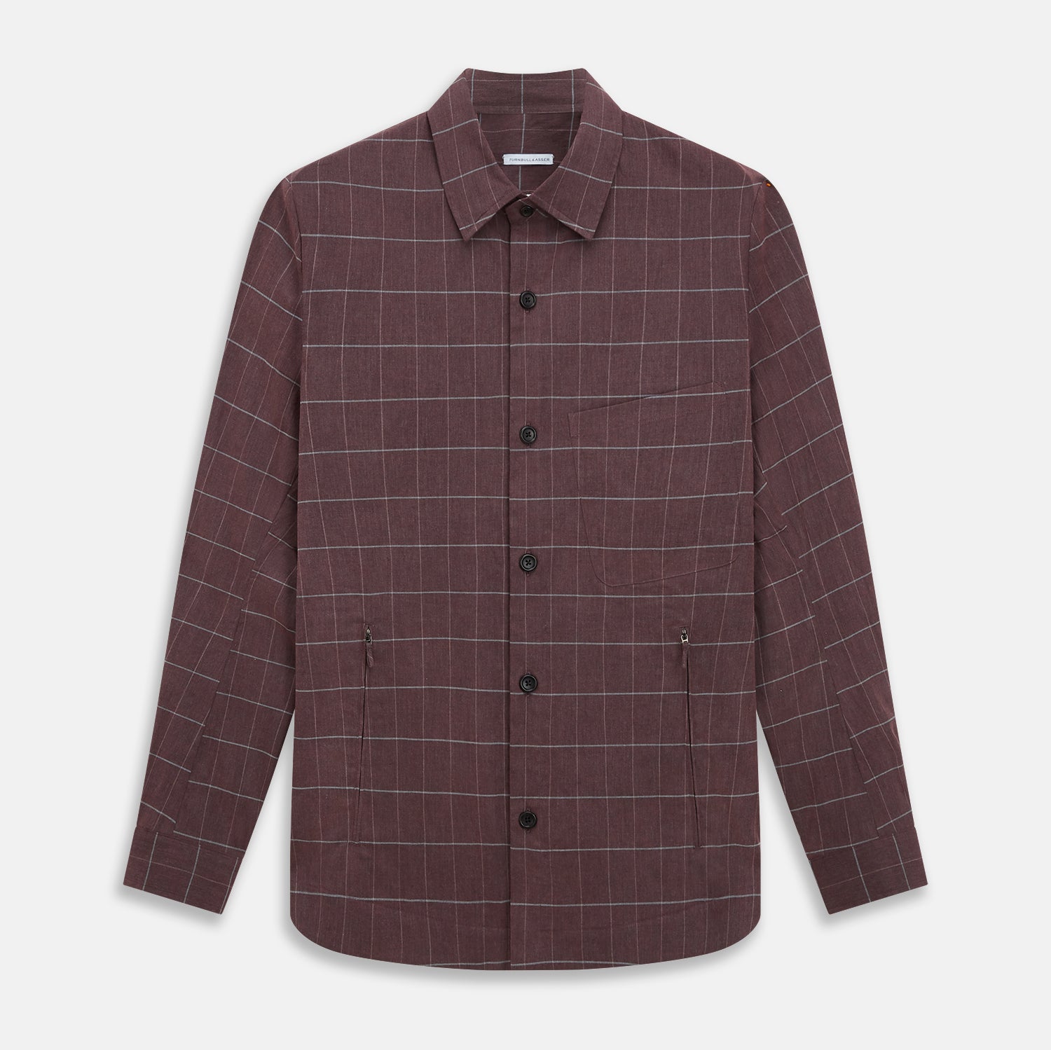 View 1 of product The Turnbull & Asser Burgundy Check Hampstead Overshirt, featuring a button-up front, collar, white windowpane pattern, and two front pockets, is laid flat on a white background—perfect for elegant formal wear.