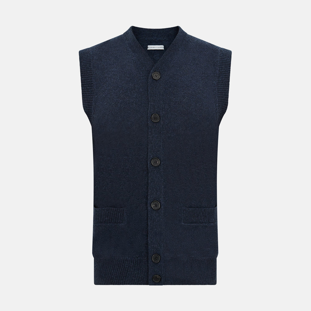 The Turnbull & Asser Navy Melange Cashmere Sleeveless Cardigan features a V-neck, button-down front, ribbed hem and armholes, and two front pockets—ideal for layering. Shown against a plain white background.