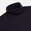 View 2 of product The Turnbull & Asser Dark Purple Fine Merino High Neck Jumper is shown against a white background. This classic sweater features a fitted collar and a simple, timeless design with no visible patterns or logos.