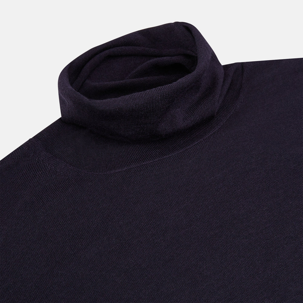 The Turnbull & Asser Dark Purple Fine Merino High Neck Jumper is shown against a white background. This classic sweater features a fitted collar and a simple, timeless design with no visible patterns or logos.
