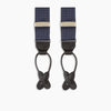 View 3 of product Turnbull & Asser Navy & White Small Spot Adjustable Silk Braces feature black leather loops and silver clasps—timeless accessories displayed on a white background.