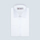 A neatly folded White Sea Island Quality Cotton Twill Shirt by Turnbull & Asser, featuring a T&A collar and 3-button cuffs, is displayed on a light grey background with a label visible inside the collar.