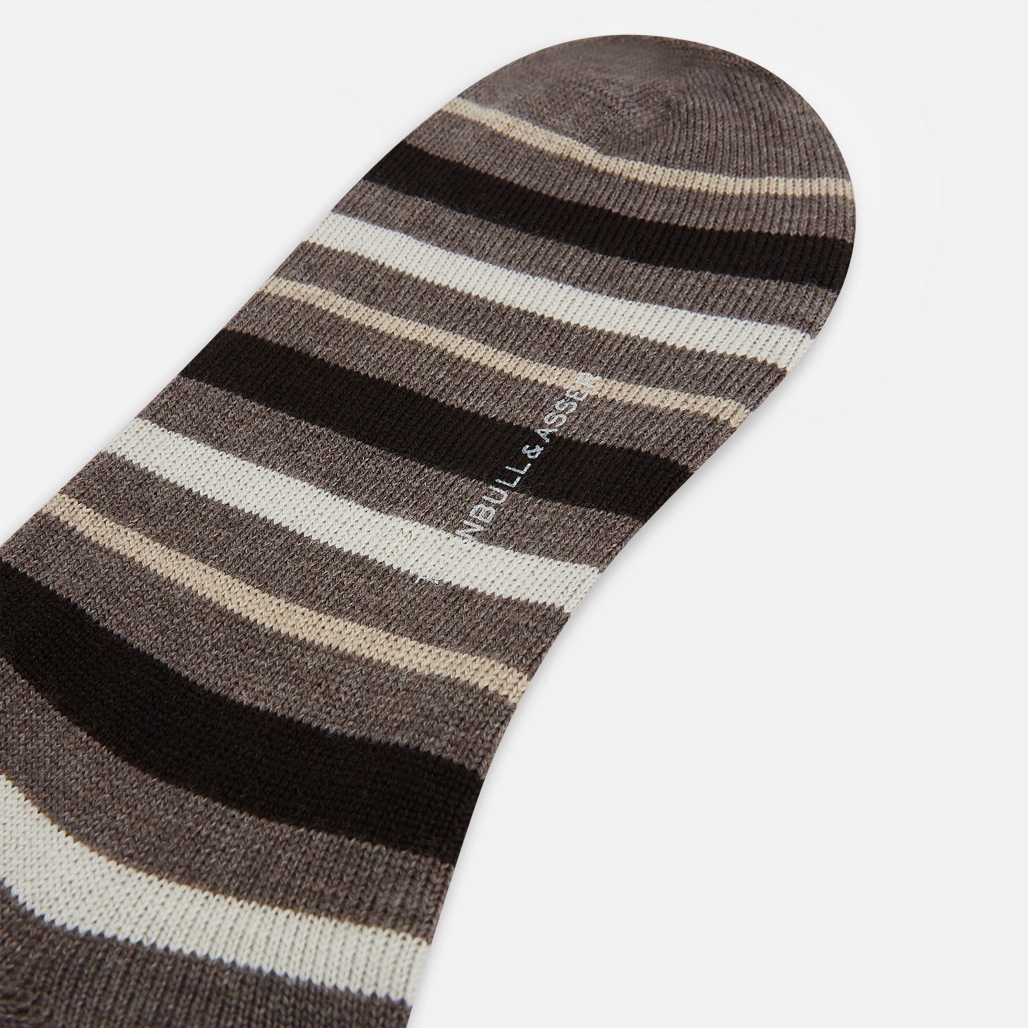 View 3 of product The Coffee Striped Merino Wool Long Socks by Turnbull & Asser feature knee-high length with horizontal brown, beige, and cream stripes, shown against a plain white background.