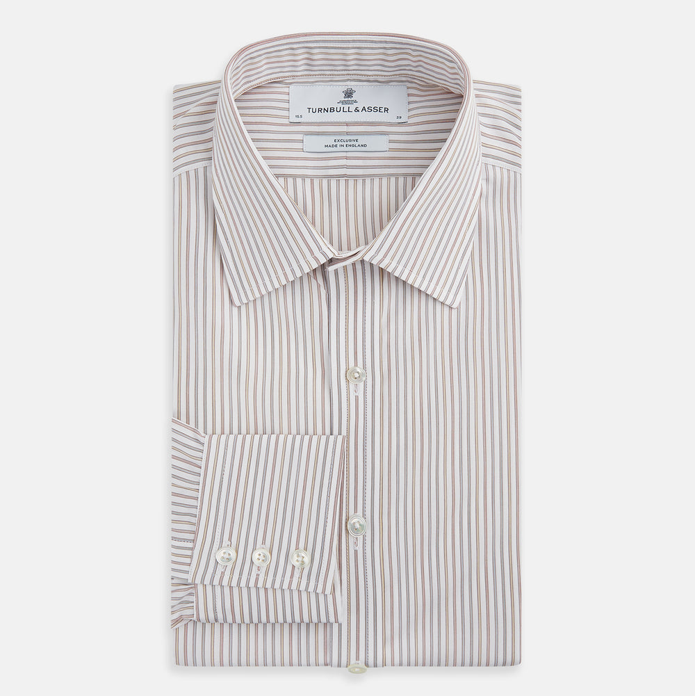 The Red with Multicoloured Music Stripe Mayfair Shirt by Turnbull & Asser is a long-sleeve, button-up shirt with a collar, featuring vibrant multicoloured stripes, inspired by classic British design, neatly laid flat on a plain background.