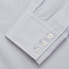 View 3 of product The Turnbull & Asser Faded Blue Block Check Cotton Regular Fit Mayfair Shirt, featuring long sleeves, a classic collar, and white buttons, is neatly laid flat on a white background.