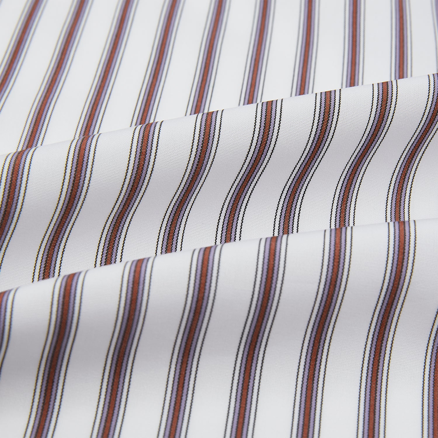 View 5 of product The Burgundy Multi Stripe Winston Gown by Turnbull & Asser features long sleeves, a shawl collar, waist belt, three pockets, and red piping accents for a classic Churchill-inspired touch.