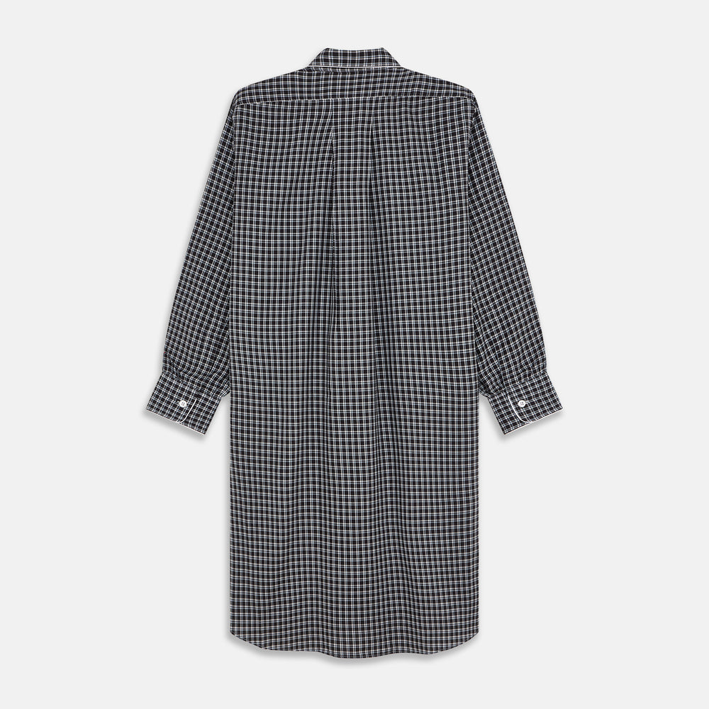The Turnbull & Asser Black Multi Check Cotton Blend Sussex Nightshirt features a long sleeve, knee-length design with front buttons, a pointed collar, and chest pocket—ideal for those who love luxury sleepwear.