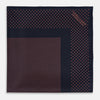 View 3 of product The Turnbull & Asser Navy and Orange Dot Silk Pocket Square features exquisite handmade craftsmanship.