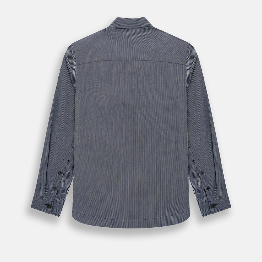 Turnbull & Asser’s Navy Stripe Highbury Overshirt with long sleeves, button-up front, black buttons, collar, and a left chest pocket is shown laid flat on a white background.