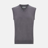 View 1 of product The Turnbull & Asser Slate Grey V-neck Cashmere Vest, shown against a white background, is a sophisticated sleeveless jumper ideal for refined ensembles.