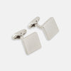 View 1 of product Turnbull & Asser's Silver Textured Square Cufflinks feature a dotted, polished finish and are showcased against a plain white background.