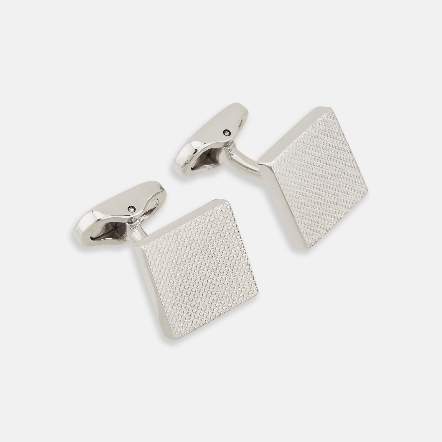 View 1 of product Turnbull & Asser's Silver Textured Square Cufflinks feature a dotted, polished finish and are showcased against a plain white background.