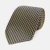 View 1 of product The Turnbull & Asser Yellow and Navy Diamond Silk Tie, with a refined yellow and light blue grid pattern, is elegantly rolled up on a plain white background.