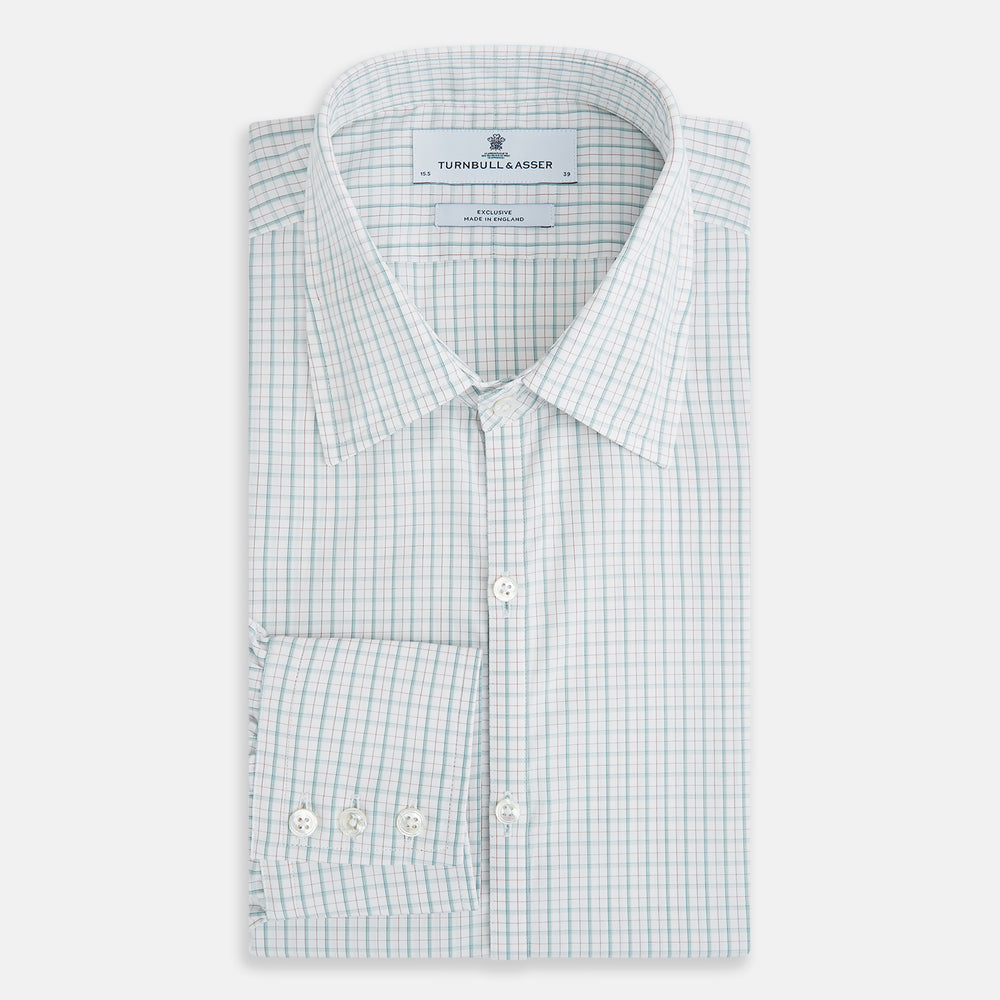 The Turnbull & Asser Turquoise and Red Multi Check Westminster shirt features long sleeves, a standard collar, and buttoned cuffs, showcasing fine British craftsmanship. It’s pictured laid flat on a white background.