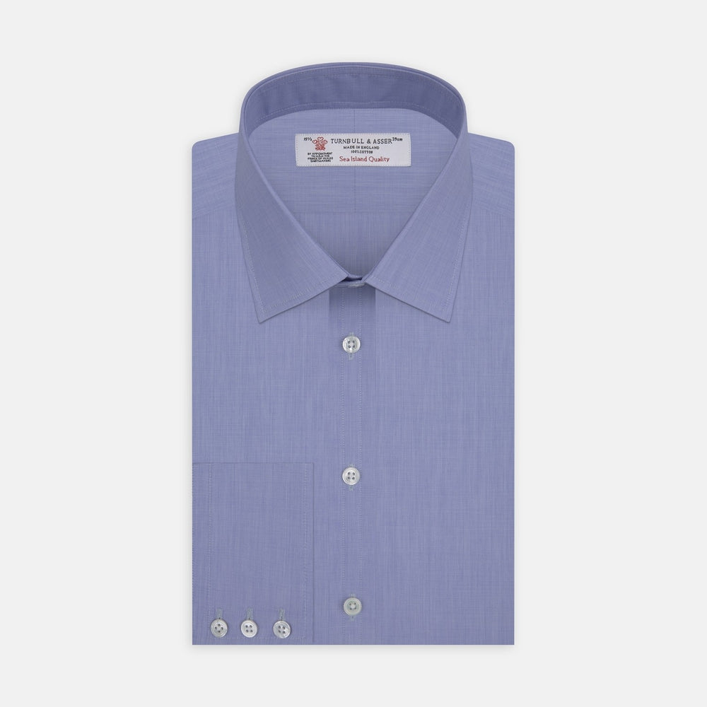 A close-up of Turnbull & Asser's Blue End-on-End Sea Island Quality Cotton Fabric, framed by a circular gray and white border on a plain white background.