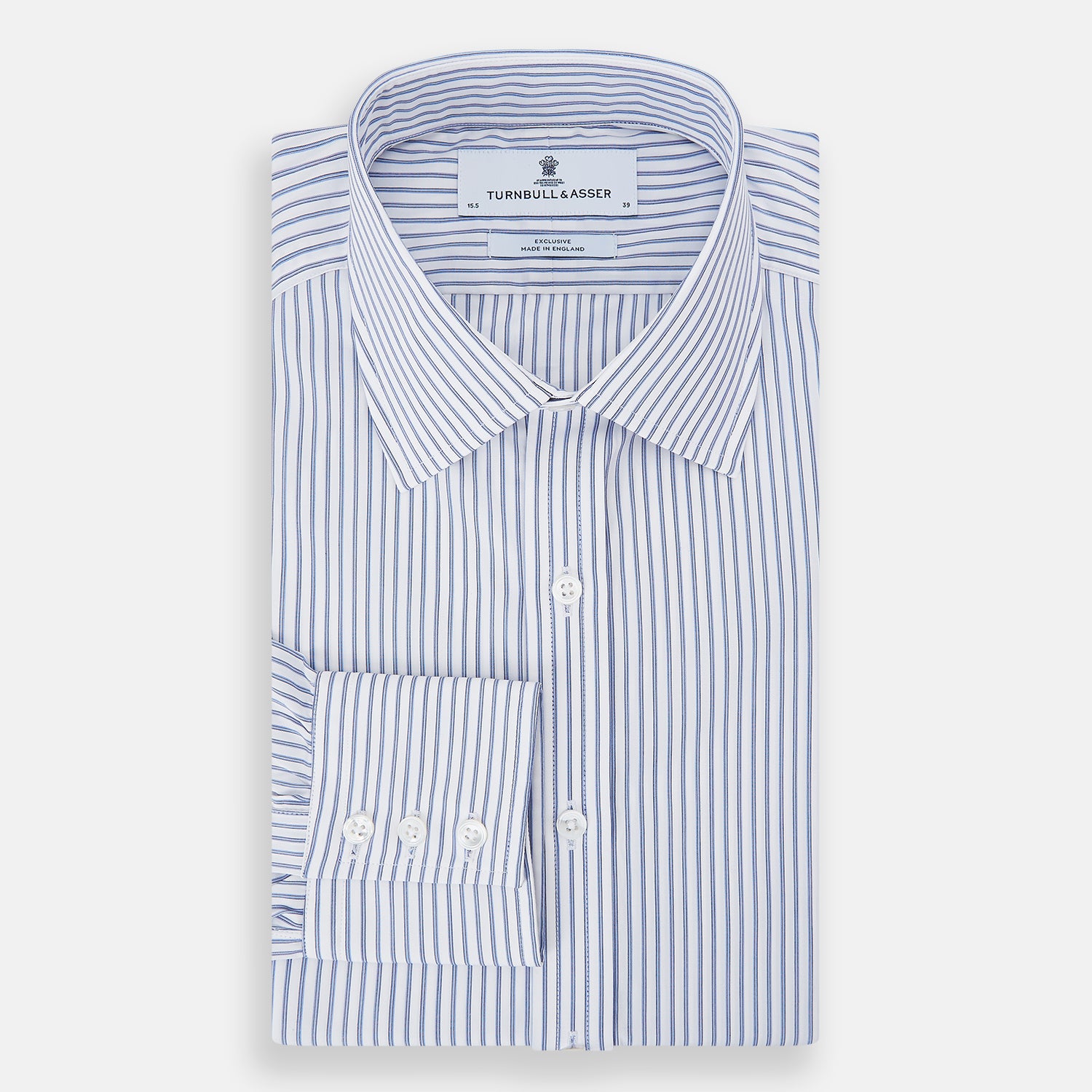 View 5 of product The Turnbull & Asser Navy Double Pinstripe Mayfair Shirt is a long-sleeve, button-up collared shirt with thin vertical blue and white stripes, shown against a plain white background.
