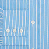 View 4 of product The Turnbull & Asser Sky Blue Wide Pinstripe Mayfair Shirt features long sleeves, a classic collar, and buttoned cuffs, laid flat against a white background for a refined formal look.