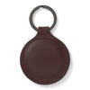 View 2 of product A burgundy leather fob holder by Turnbull & Asser, embossed with the brand name and Made in England, features a metal split keyring at the top.