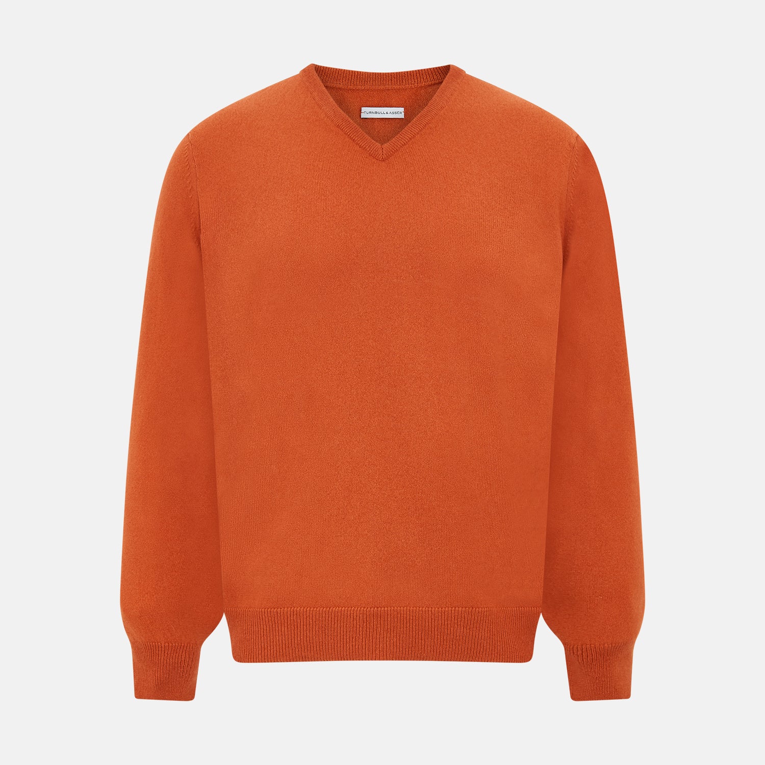 View 1 of product The Turnbull & Asser Rust Cashmere V-neck Jumper features long sleeves, ribbed cuffs and hem, and is shown against a plain white background.