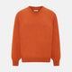 The Turnbull & Asser Rust Cashmere V-neck Jumper features long sleeves, ribbed cuffs and hem, and is shown against a plain white background.