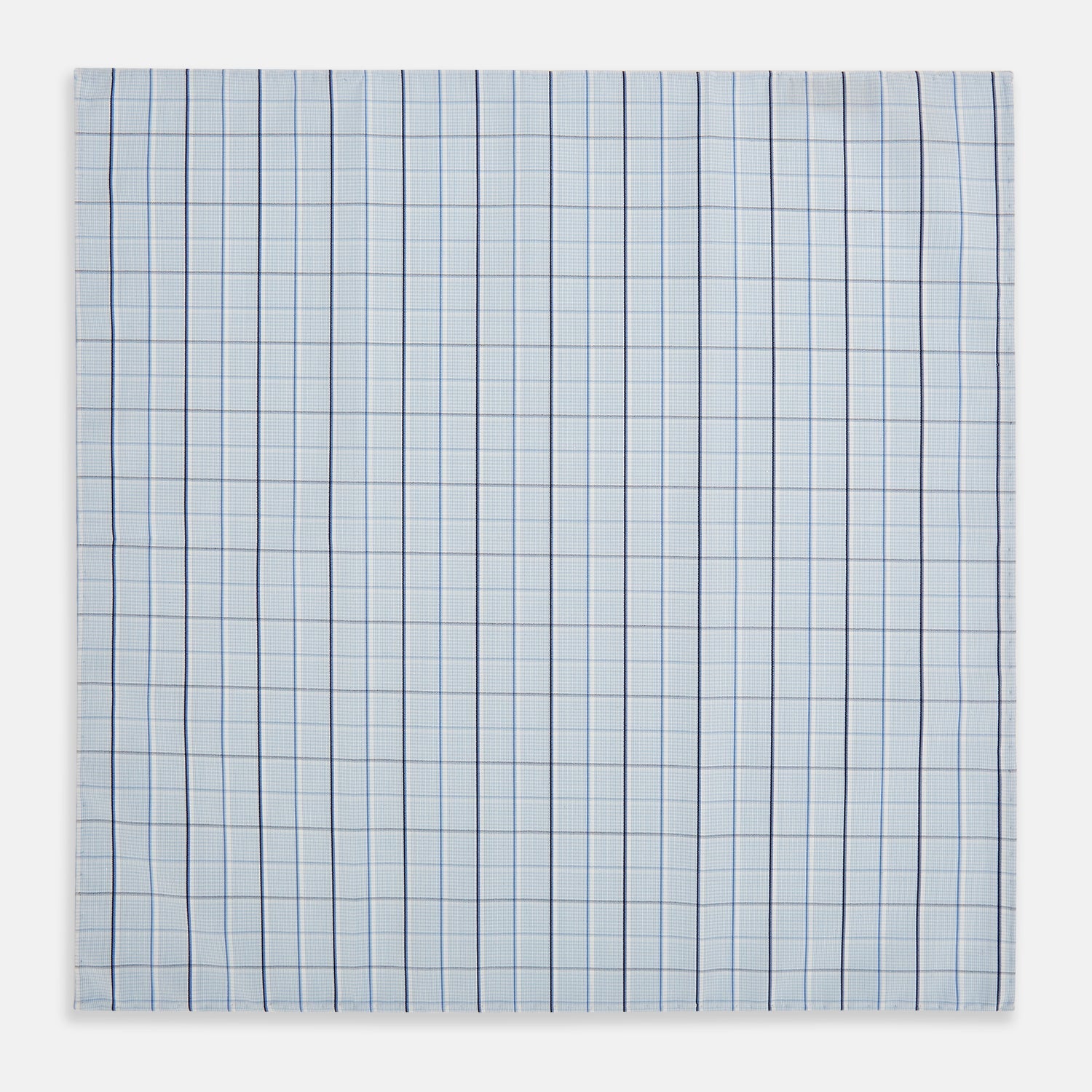 View 3 of product The Turnbull & Asser Navy and Blue Combination Check Hand-Rolled Handkerchief features a classic check pattern in navy and blue with thin white lines, shown laid flat on a white background.