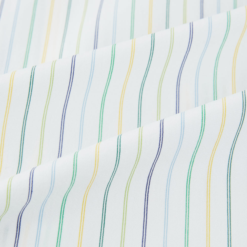 The Turnbull & Asser Multi Tone Double Pinstripe Mayfair Shirt is a long-sleeve pure cotton shirt with a collar and thin blue, green, and yellow double pinstripes on a white background.