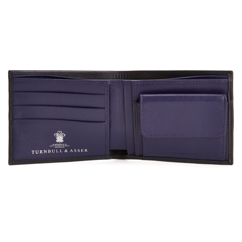 The Turnbull & Asser Bill Coin Wallet is a black leather bifold with a visible purple interior, card slots, and a coin pocket.