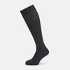 View 1 of product The Turnbull & Asser Steel/midnight Polka Dot Long Sock is shown in dark gray over the calf, displayed from the side on a white background with downward toe and ribbed top for a snug fit.