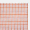 View 7 of product The Turnbull & Asser Hand Rolled Orange Graph Overlay Check Handkerchief features bold orange and white checks with blue and orange grid lines—a refined, classic accessory for any gentleman.