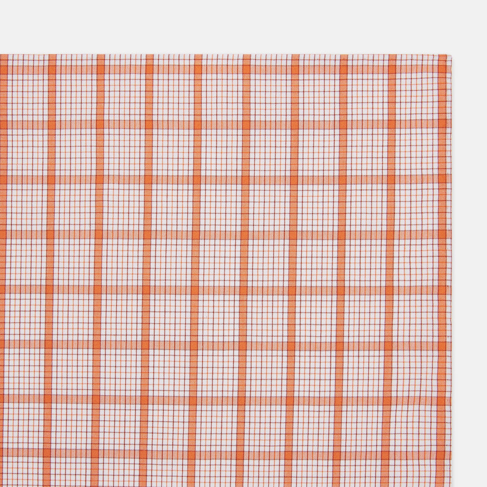 The Turnbull & Asser Hand Rolled Orange Graph Overlay Check Handkerchief features bold orange and white checks with blue and orange grid lines—a refined, classic accessory for any gentleman.