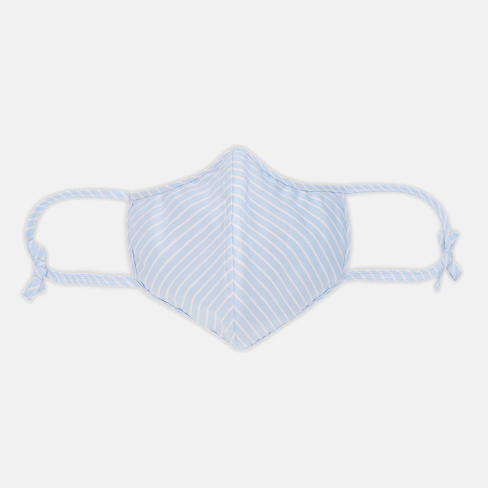 Turnbull & Asser's Exclusive Light Blue, White & Pink Stripe Commuter Mask features ear loops tied in bows and includes 3 VIROFORMULA™ filters for enhanced protection and comfort.