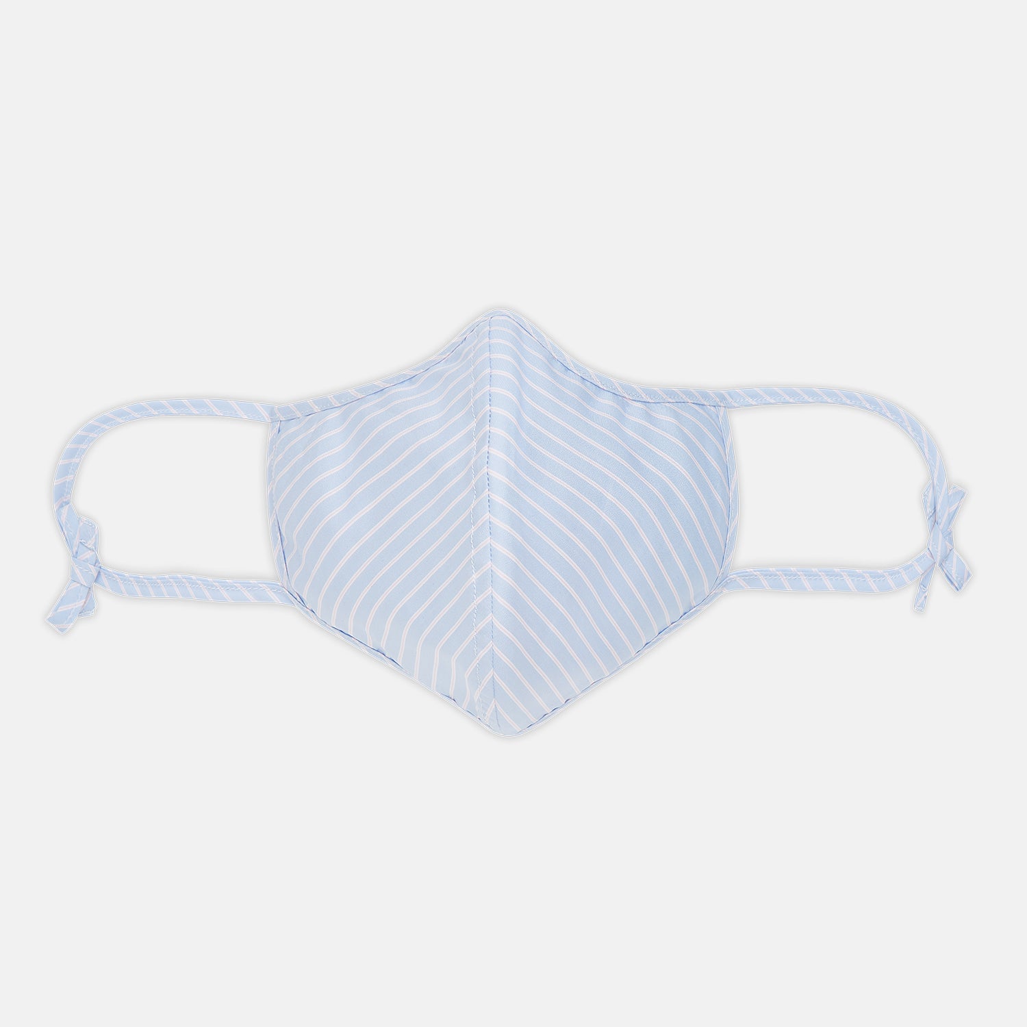 View 1 of product Turnbull & Asser's Exclusive Light Blue, White & Pink Stripe Commuter Mask features ear loops tied in bows and includes 3 VIROFORMULA™ filters for enhanced protection and comfort.