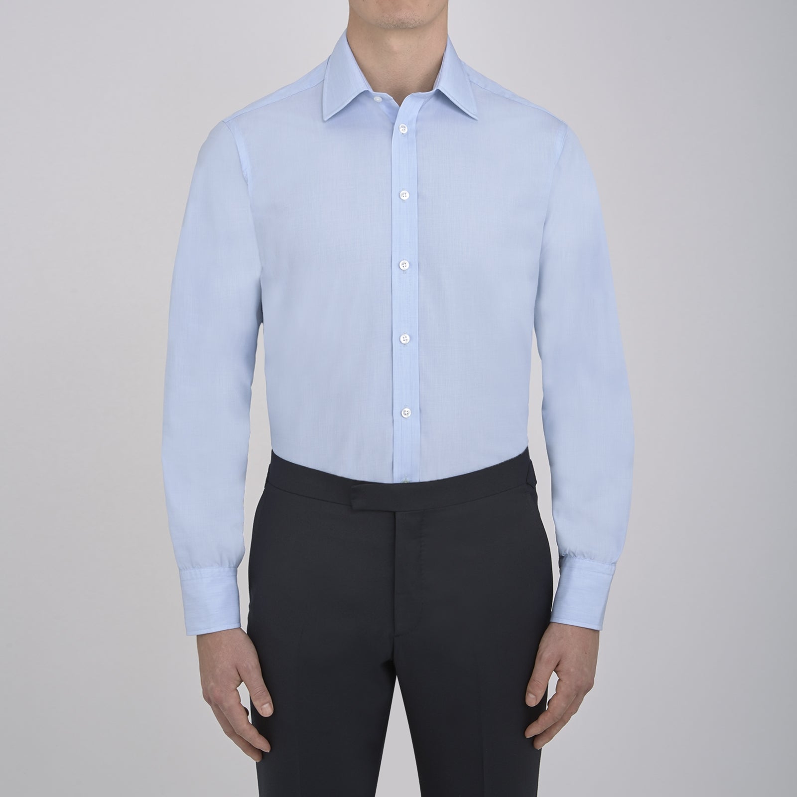 View 2 of product A Grey Cashmere Blend Shirt by Turnbull & Asser with a T&A collar and 3-button cuffs is neatly folded, showing its label, on a plain white background.