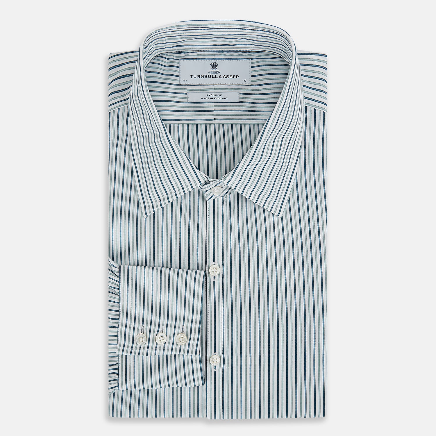 View 5 of product The GREEN DOUBLE STRIPE WESTMINSTER SHIRT by Turnbull & Asser features green and white vertical stripes, a pointed collar, buttoned cuffs, and a relaxed fit that highlights refined British craftsmanship.