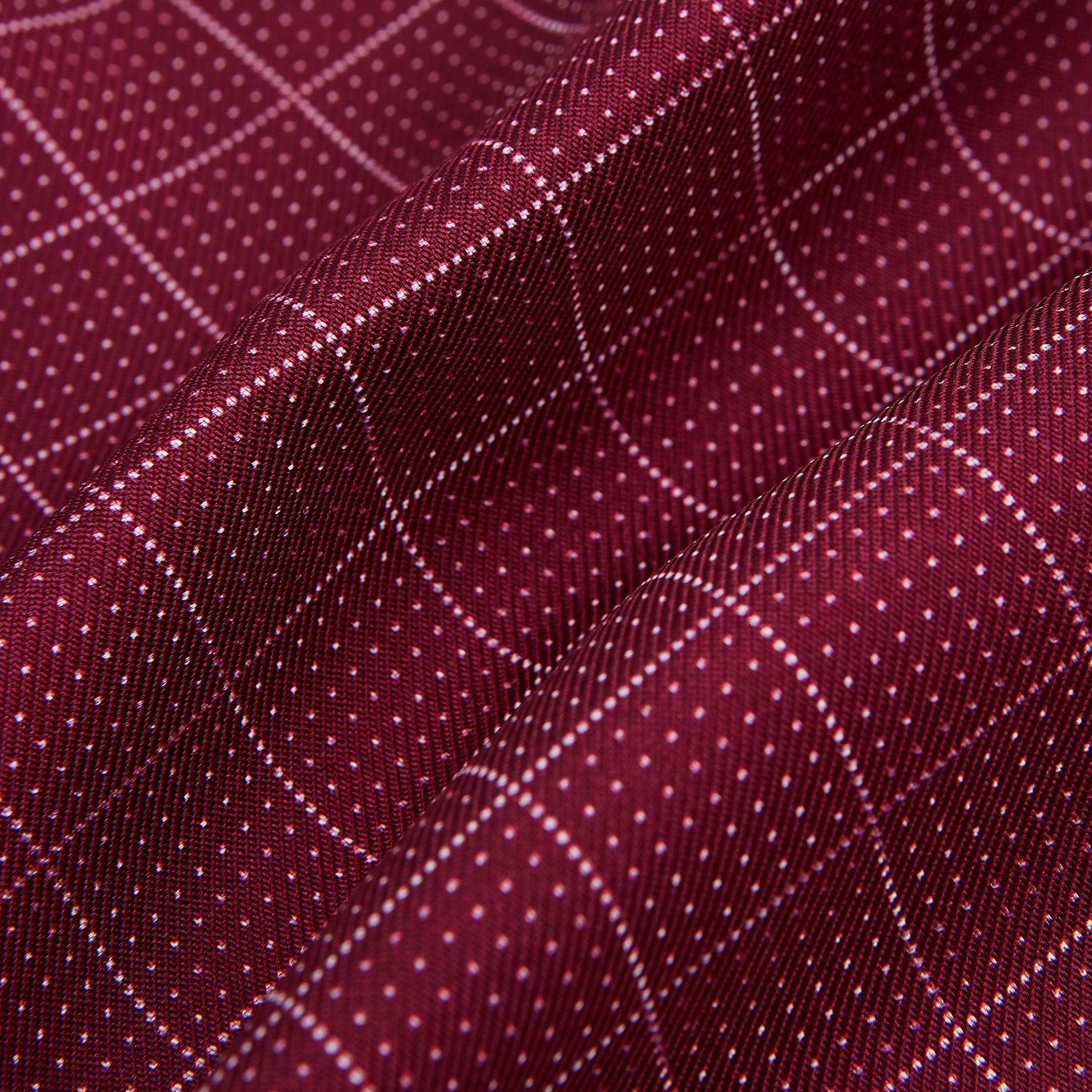 View 4 of product The Turnbull & Asser Burgundy Dotted Check Pattern Printed Silk Cravat, shown on a white background, features a refined British design perfect for elevating your look.