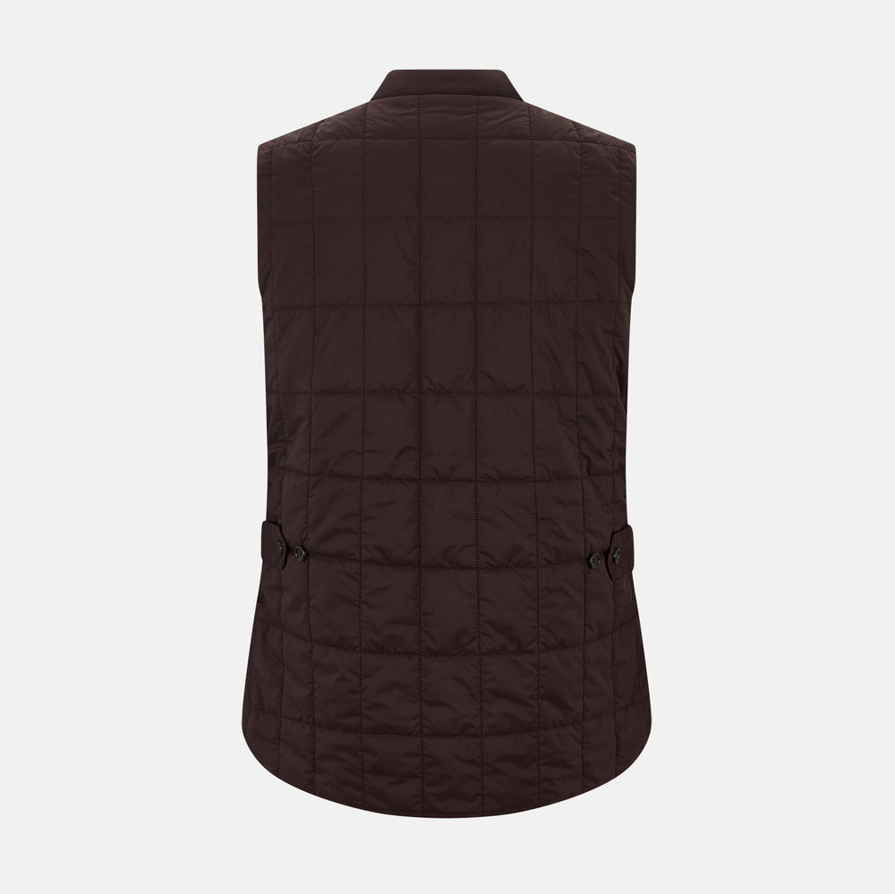 The Turnbull & Asser Burgundy Quilted Gilet is a sleeveless, lightweight layer featuring a front zipper, slanted chest pocket, adjustable side tabs, and two zippered side pockets, shown on a plain white background.